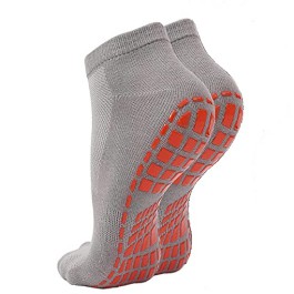Grijze sokken met oranje rubberen anti-slip stippen