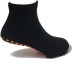 Zwarte sokken met oranje rubberen anti-slip stippen